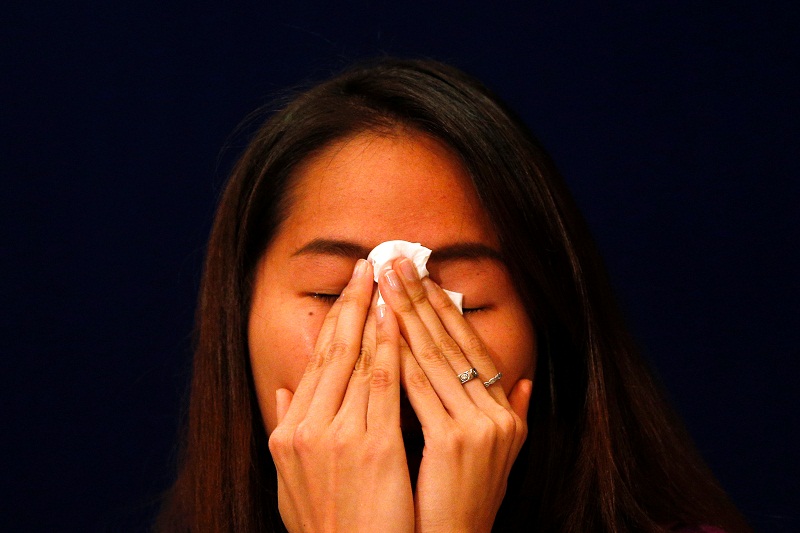 Thailandu00e2u20acu2122s badminton player and Olympics hope Ratchanok Intanon cries during a news conference at a hotel in Bangkok, Thailand, July 18, 2016. u00e2u20acu201d Reuters pic