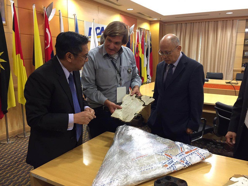 Debris believed to be parts from an aircraft found in Madagascar were handed over by Blaine Gibson to the Malaysian ICAO Annex 13 Safety Investigation Team for MH370 yesterday. u00e2u20acu201d Picture courtesy of DCA