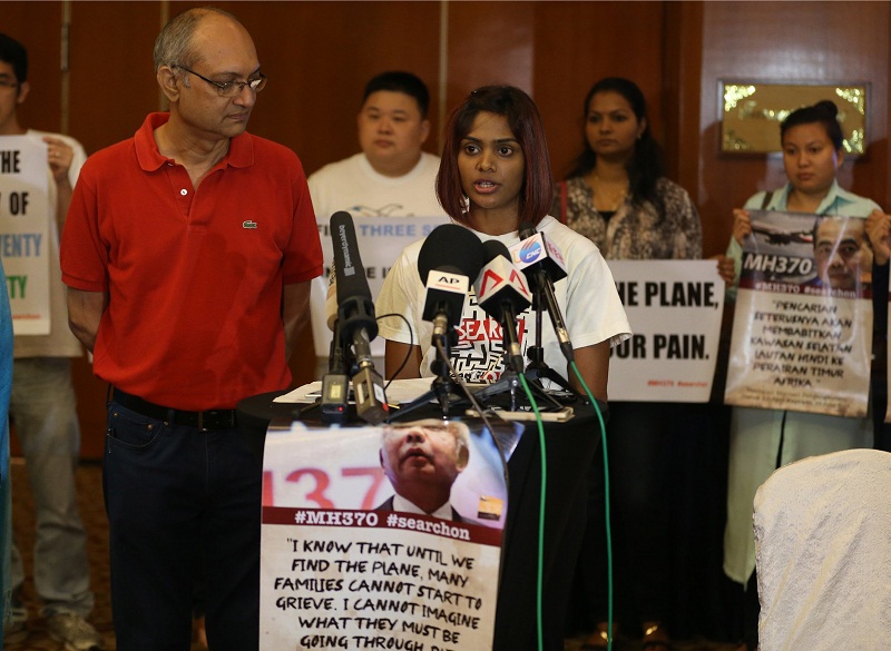 Grace Subathirai Nathan speaks during the gathering held at a hotel in Kuala Lumpur July 21, 2016. Next to her is Narendran. u00e2u20acu201d Picture by Razak Ghazali