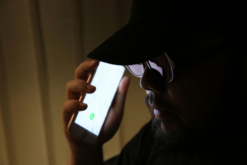 Illustration of a phone scammer. u00e2u20acu201d TODAY file photo