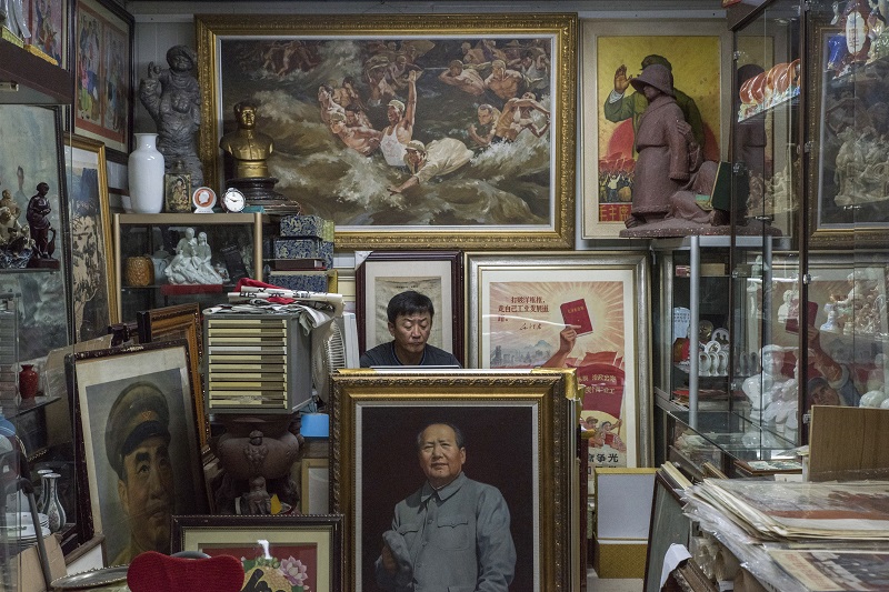 Mao-era memorabilia on display at the Panjiayuan Antique Market in Beijing, July 9, 2016. — Picture by Gilles Sabrie/The New York Times