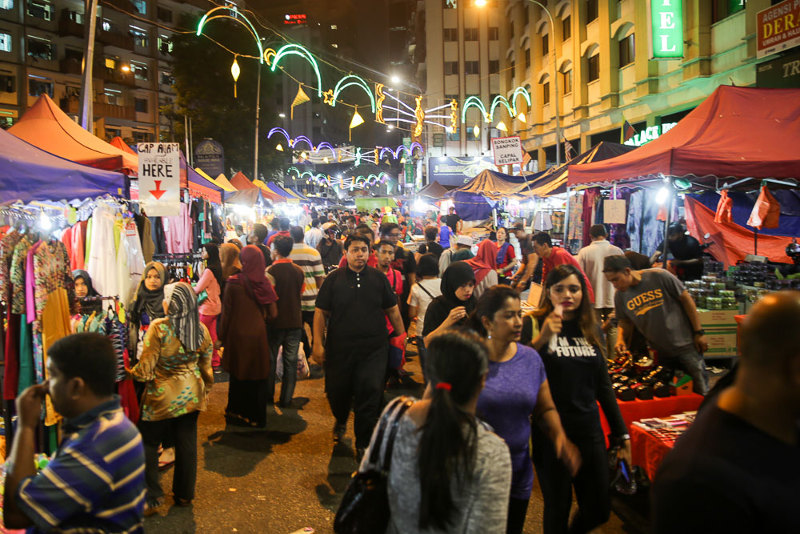 People are seen shopping for Hari Raya Aidilfitri at the Ramadan bazaar along Jalan Masjid India, Kuala Lumpur, July 4, 2016. u00e2u20acu201d Picture by Choo Choy May