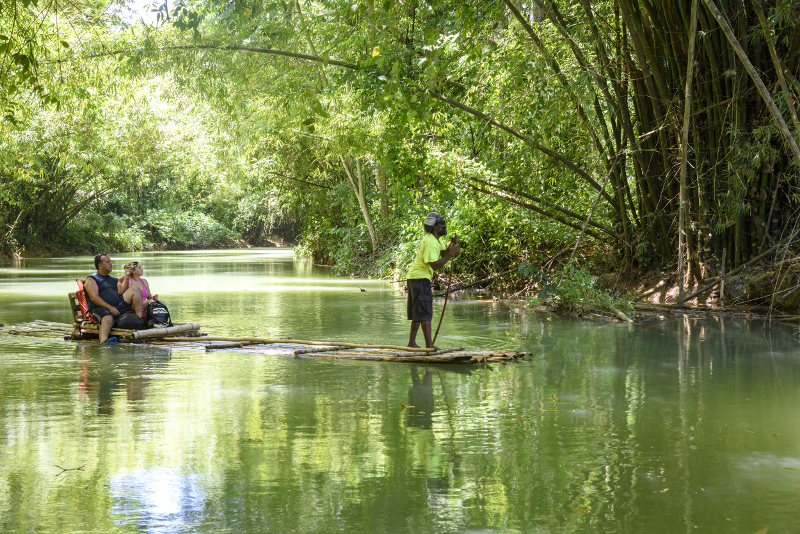 A couple on a rafting ride on the Martha Brae River in Falmouth, Jamaica, July 13, 2016. Usain Bolt, the Olympic gold medalist sprinter, recommends a run along this river, near his hometown of Sherwood Content. — Moris Moreno/The New York Times pic