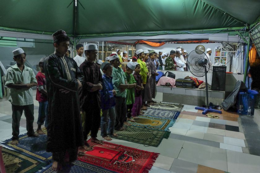 Muslim Rohingya children perform dawn prayers during the month of Ramadan at a Madrasah in Klang on July 02, 2016. u00e2u20acu201d Picture by Yusof Mat Isa