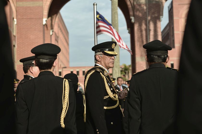 Outgoing Malaysian Anti-Corruption Commission chief Tan Sri Abu Kassim Mohamed bids his men goodbye before leaving the MACC headquarters July 29, 2016. u00e2u20acu2022 Picture by Yusof Mat Isa