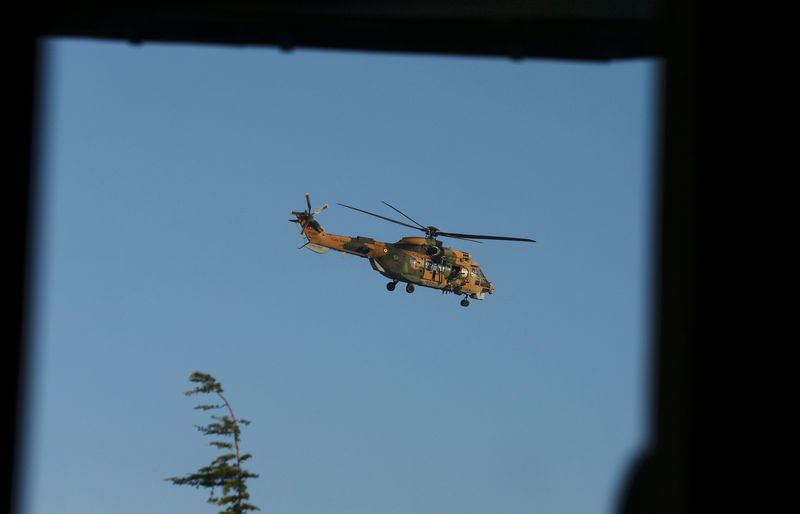 A helicopter hovers near the Ataturk Airport in Istanbul July 16, 2016. u00e2u20acu201d Reuters pic