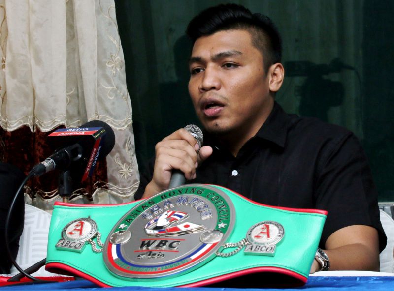Mohammed Farkhan Mohd Haron at his press conference in Banafee Village in Johore Baru July 26, 2016, with the Asian Boxing Council cruiserweight belt he won on July 23, 2016. u00e2u20acu201d Bernama pic