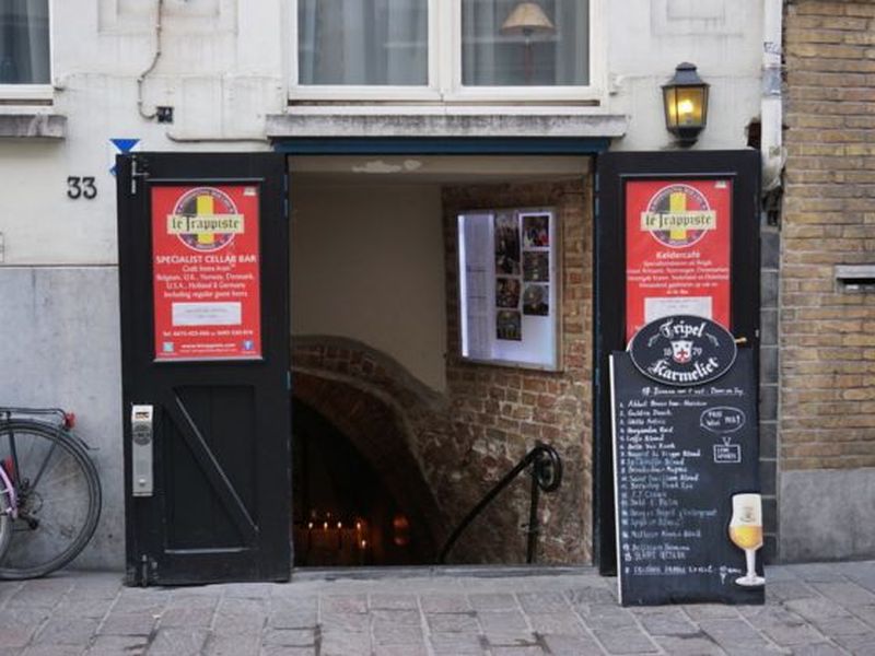 Entrance to Le Trappiste, a bar set in a 13th-century cellar to enjoy its one-of-a-kind ambience and wide selection of Belgian and international beers on tap and in bottles.