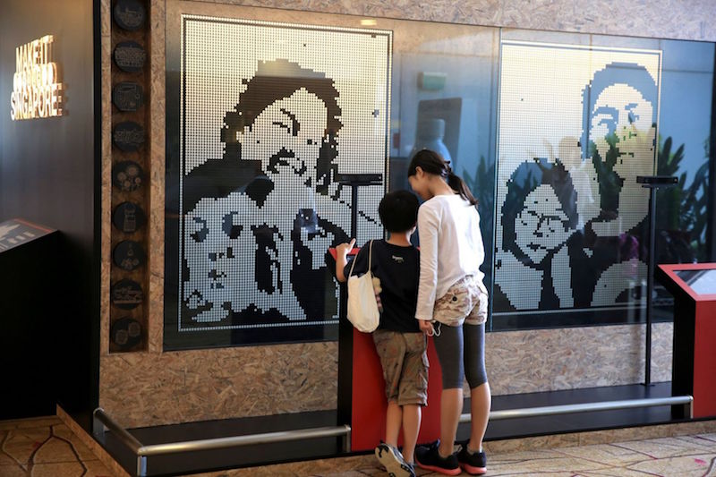 Changi Airport’s new LED ‘Dots Portrait Wall’ enables travellers to bring home a little futuristic souvenir — a monochromatic portrait of themselves. — TODAY pic