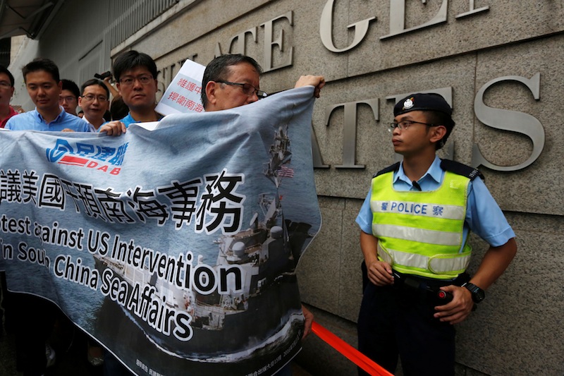 Protesters from a local pro-China party demonstrate against the United States supporting an international court ruling that denied China's claims to the South China Sea in Hong Kong, China July 14, 2016. u00e2u20acu201d Reuters pic