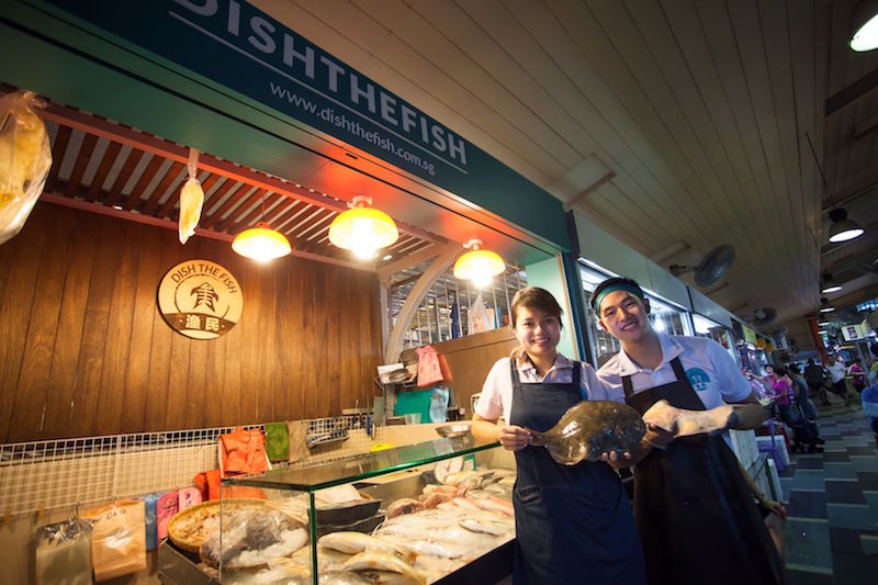 Jeffrey Tan and wife Angeline at their stall in Beo Crescent. u00e2u20acu201d TODAY pic