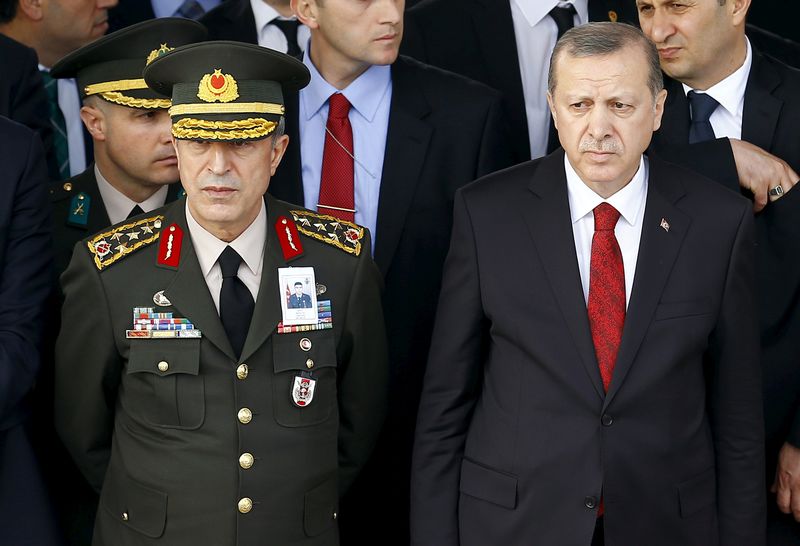 Turkish President Tayyip Erdogan (right) and Chief of Staff General Hulusi Akar attend a funeral ceremony for Army officer Seckin Cil in Ankara February 18, 2016. u00e2u20acu201d Reuters pic
