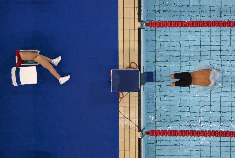 Bob Martin (British, born 1959). Avi Torres of Spain sets off at the start of the 200m freestyle heats, Paralympic Games, Athens, September 1, 2004, printed 2016.© Courtesy of Bob Martin/Sports Illustrated