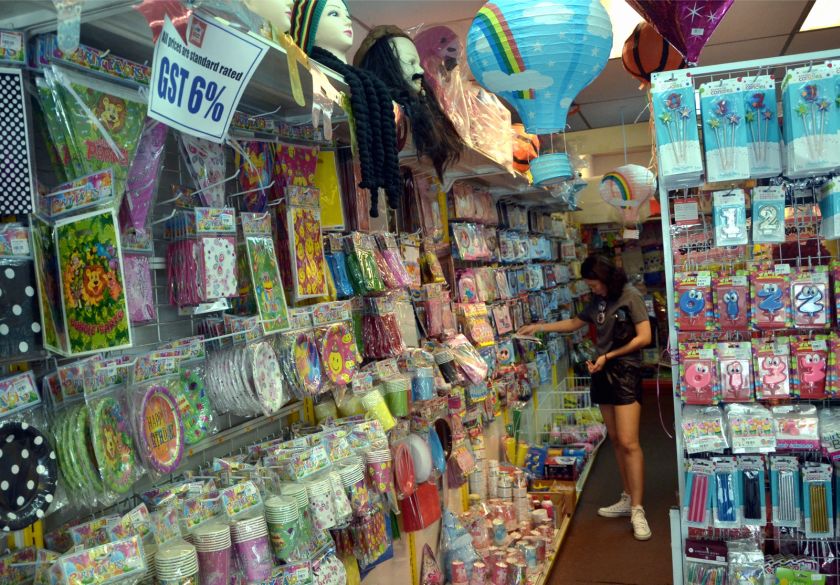 Shop owners say the six per cent GST has increased their costs as suppliers are charging them more. u00e2u20acu201d Picture by Mukhriz Hazim
