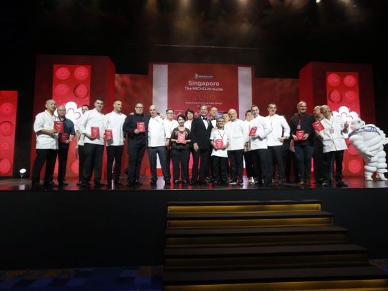 The recipients of the Michelin stars gather onstage to celebrate their accolades. u00e2u20acu2022 Picture  by Ernest Chua/TODAY
