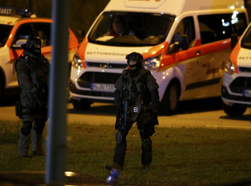 Special force police officers stand guard in front of an ambulance near the Olympia shopping mall, following a shooting rampage at the mall in Munich, Germany July 23, 2016. u00e2u20acu2022 Reuters pic