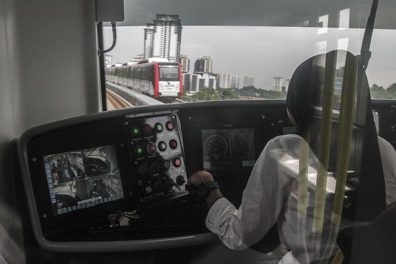 A driver of a new Sri Petaling LRT train. Many LRT users and car drivers in the Klang Valley cite convenience as the reason for their choices. ― Picture by Yusof Mat Isa