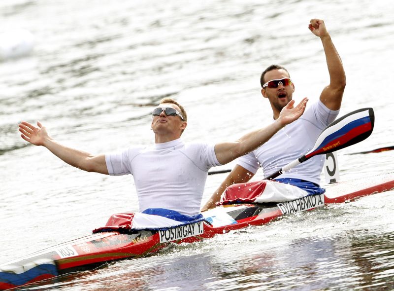 Yury Postrygay (L) and Alexander Dyachenko of Russia win K2 Men 200m Final, ICF Canoe Sprint World Championships, Sportpark Wedau, Duisburg, western Germany, September 1, 2013. AFP PHOTO / DPA / ROLAND WEIHRAUCH