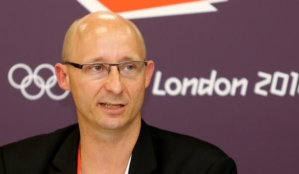 Thomas Lund, secretary general of the Badminton World Federation, speaks at a news conference during the London 2012 Olympic Games in this file photo dated August 1, 2012.REUTERS/BAZUKI MUHAMMAD