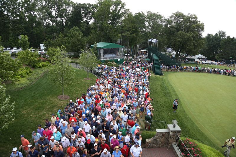 Fans exit the golf course to seek shelter in a weather delay during the third round of the 2016 PGA Championship golf tournament in Springfield July 30, 2016. u00e2u20acu201d USA TODAY Sports/Reuters pic 
