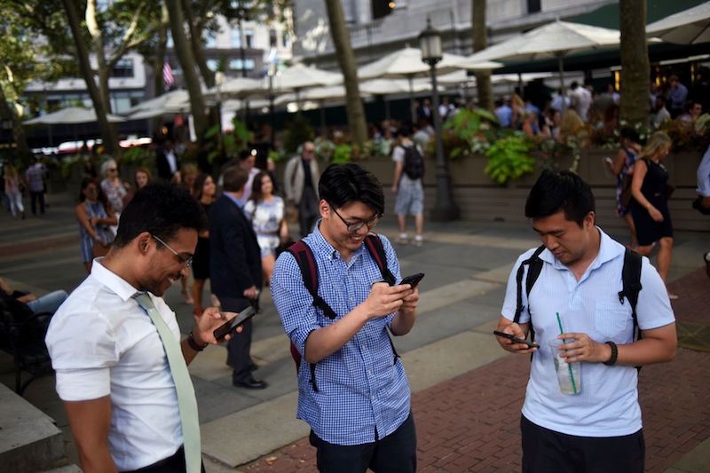 People play the augmented reality mobile game 'Pokemon Go' by Nintendo in New York July 11, 2016. u00e2u20acu201d Reuters pic