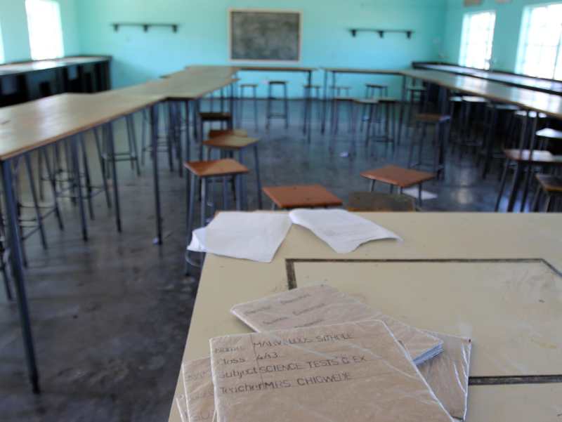 Books are seen in an empty classroom at Epworth Secondary School in Epworth near Harare, Zimbabwe, July 5, 2016. u00e2u20acu201d Reuters pic