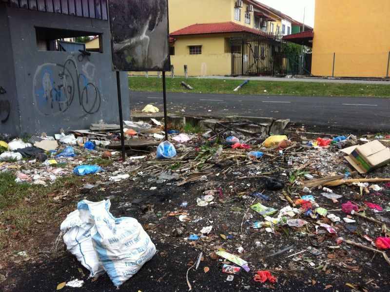 Residents burn their trash as they fear it would become a mosquito breeding ground.