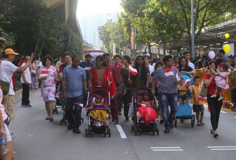 Punggol residents, along with participating groups, at the Punggol North Racial and Religious Harmony Street Parade on July 17. u00e2u20acu201d TODAY pic