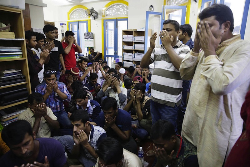 Bangladeshi workers here gathered yesterday for a prayer session for the victims of the Dhaka attack. u00e2u20acu201d TODAY pic