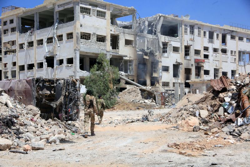 Forces loyal to Syria's President Bashar al-Assad walk past rubble after they advanced on the southern side of the Castello road in Aleppo, Syria, in this handout picture provided by SANA on July 28, 2016. u00e2u20acu2022 Reuters pic