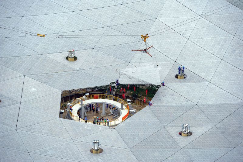 The last panel of Chinau00e2u20acu2122s world largest radio telescope named u00e2u20acu02dcFASTu00e2u20acu2122 is installed in Pingtang county, Guizhou Province, July 3, 2016. China Daily/via REUTERS 
