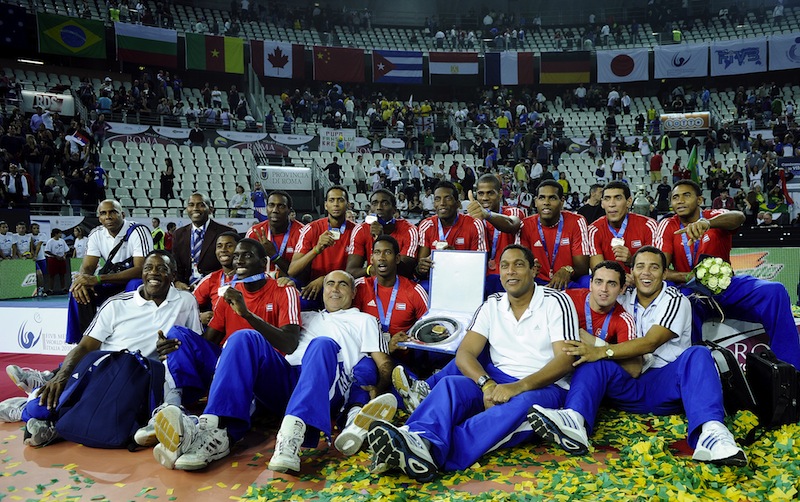 Members of the Cuban national Volleyball team players celebrate their second place after Brazil won their third cosecutive World Championships after winning the final against Cuba in Rome's Palalottomatica on October 10, 2010. u00e2u20acu201d AFDP pic