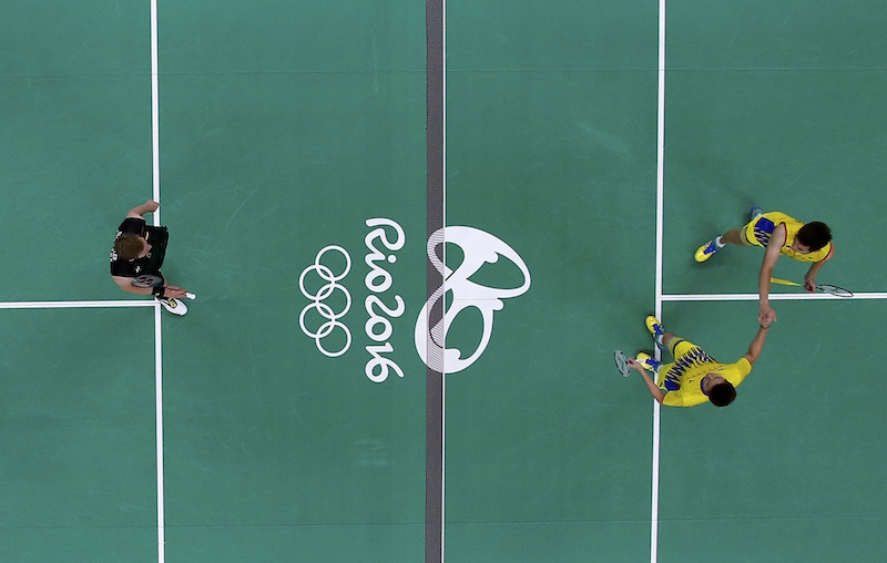 Goh V Shem and Tan Wee Kiong of Malaysia shake hands after winning their match against Michael Fuchs and Johannes Schottler of Germany in the badminton menu00e2u20acu2122s doubles group play in Rio de Janeiro August 11, 2016. u00e2u20acu201d Reuters pic