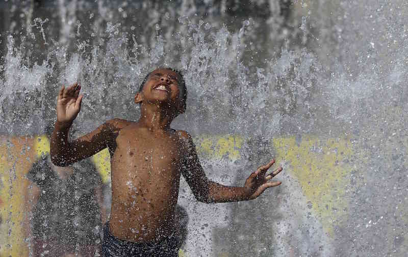A boy plays in a fountain on the Southbank in London August 17, 2016. u00e2u20acu201d Reuters pic