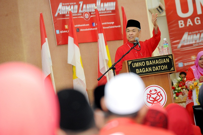 Deputy Prime Minister Datuk Seri Dr Ahmad Zahid Hamidi speaks during the Bagan Datoh Umno delegates meeting at Wisma Umno, Hutan Melintang in Bagan Datoh, Aug 6, 2016. u00e2u20acu201d Bernama pic