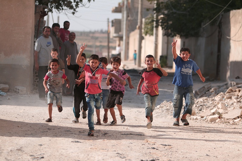 Children flash victory signs as they play in Manbij, in Aleppo Governorate, Syria, August 9, 2016. u00e2u20acu201d Reuters pic