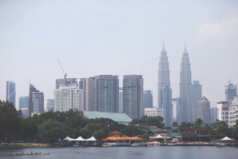 Despite seemingly clear skies and good visibility, Malaysia is under imminent danger of being smothered by trans-boundary haze from Indonesia. u00e2u20acu201d Picture by Ahmad Zamzahuri