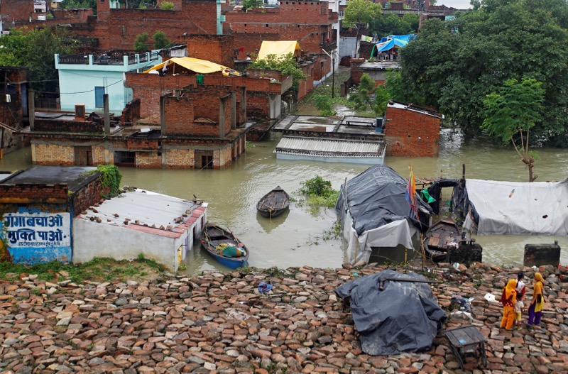 Partially submerged houses are pictured on the flooded banks of the Ganga river in Allahabad, India, August 23, 2016.  u00e2u20acu201d Reuters pic
