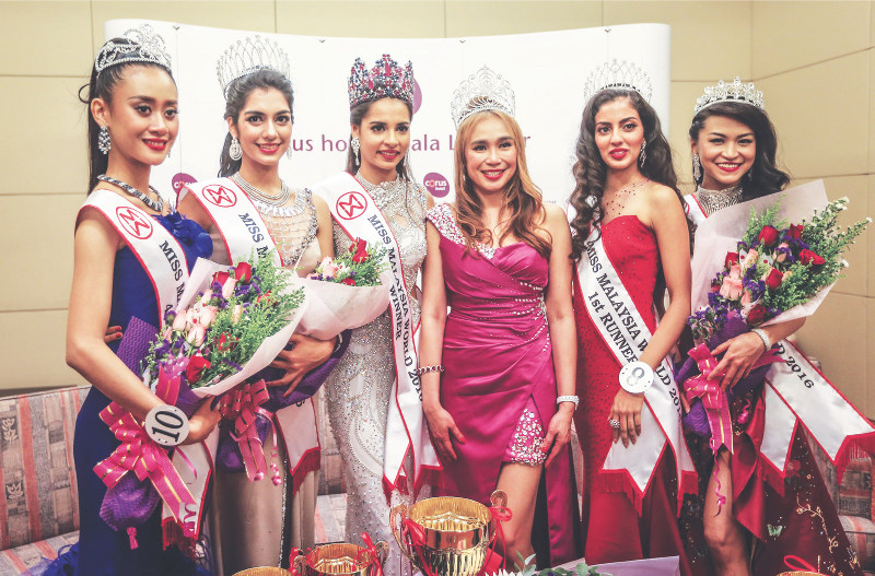 Picture shows Miss Malaysia World 2016 contestants (from left) Luhong, Shweta, Tatiana, Lim, Dr Ranmeet and Jessica Lim. u00e2u20acu201d Picture by Firdaus Latif