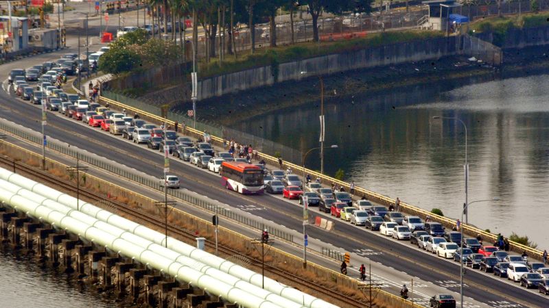 Congested traffic from the Woodlands Checkpoint to the Causeway. u00e2u20acu201d Picture by Roslan Khamis