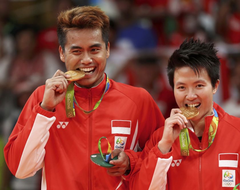 Ahmad (left) and Natsir were Indonesiau00e2u20acu2122s only gold medal winners in Rio, beating Chan Peng Soon and Goh Liu Ying of Malaysia in the badminton mixed doubles. u00e2u20acu2022 Reuters pic