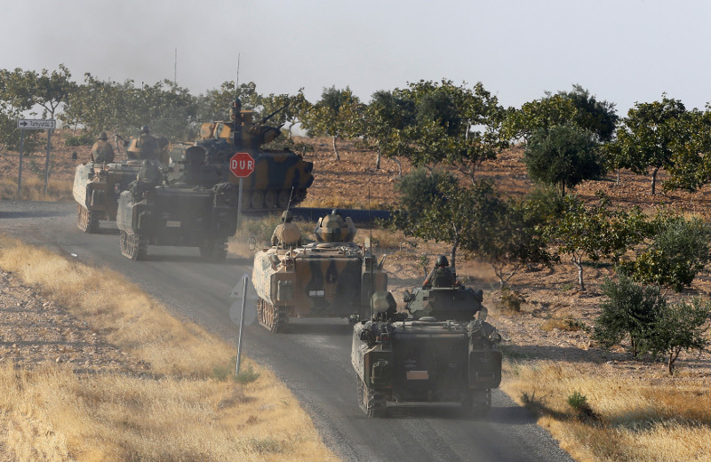 Turkish armoured personnel carriers drive towards the border in Karkamis on the Turkish-Syrian border in the south-eastern Gaziantep province, Turkey, August 27, 2016. — Reuters pic