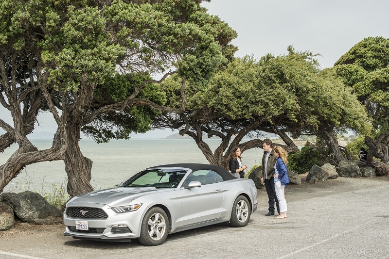 The character Sarai, played by Janelle Jacoban, gives Phin Upham and April Thygeson instructions and keys a convertible for their adventure, at Golden Gate Fields in Berkeley, California, July 16, 2016. — Picture by Drew Kelly/The New York Times
