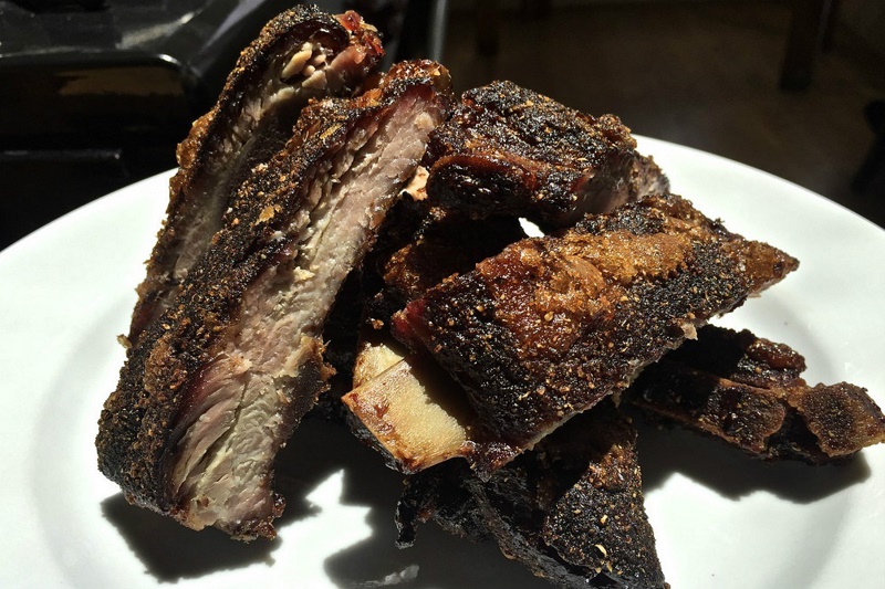 Dry rub pork ribs cut apart after slow roasting and ready for serving. u00e2u20acu2022 Picture by David Latt/Zester Daily 