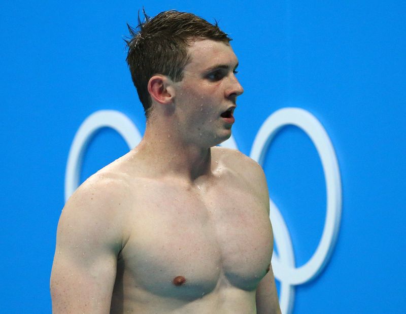 Adam Peaty of United Kingdom reacts after setting a new world record in the men's 100m breaststroke during the Olympic swimming heats at the Olympic Aquatics Stadium, Rio de Janeiro August 6, 2016. u00e2u20acu201d Reuters pic