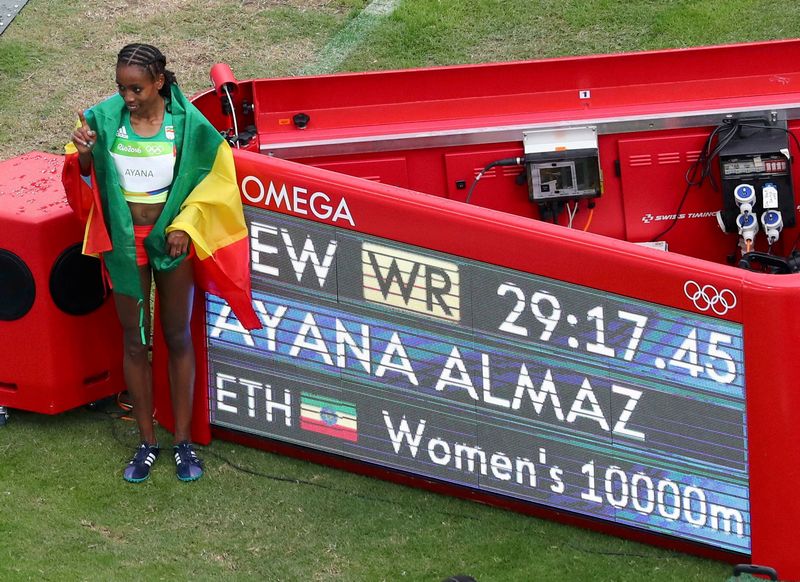 Almaz Ayana Ethiopia poses for photographers after she set a new world record in the women's 10,000m final at the Rio de Janeiro Olympic Stadium August 12, 2016. u00e2u20acu201d Reuters pic