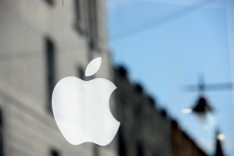 An Apple logo is seen in the window of an authorised apple reseller store in Galway, Ireland August 30, 2016. u00e2u20acu2022 Reuters pic