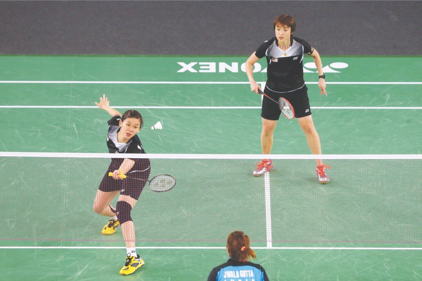 Khe Wei (left) and Vivian canu00e2u20acu2122t wait to see what they can produce in the Olympics. u00e2u20acu201d Getty pic