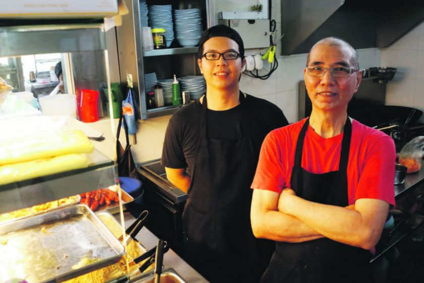 Benjamin Aw Li Seng, 27, at his stall Dong Shun Vegetarian. — TODAY pic