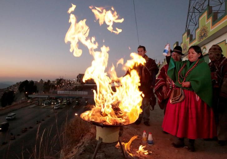 Bolivian Aymara people attend a ceremony to make offerings for the 'Pachamama' (Mother Earth) in El Alto, Bolivia August 1, 2016. u00e2u20acu201d Reuters pic 